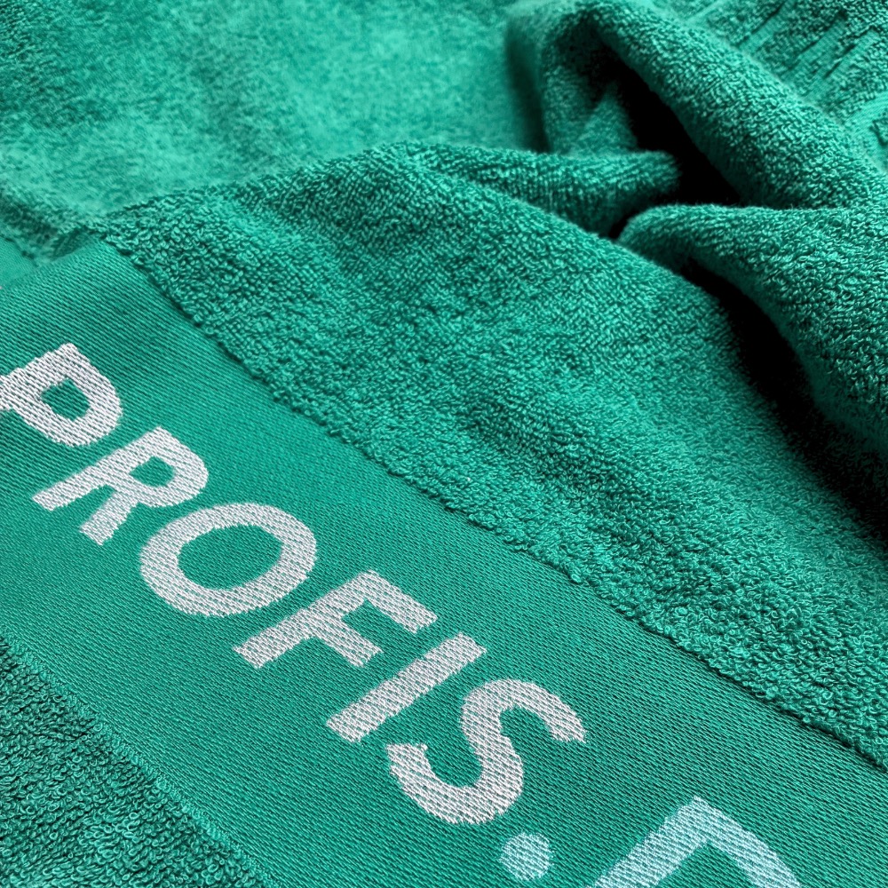 Handtuch Bordüreneinwebung in Grün: Handtuch-Profis-Schriftzug in Weiß in der Bordüre