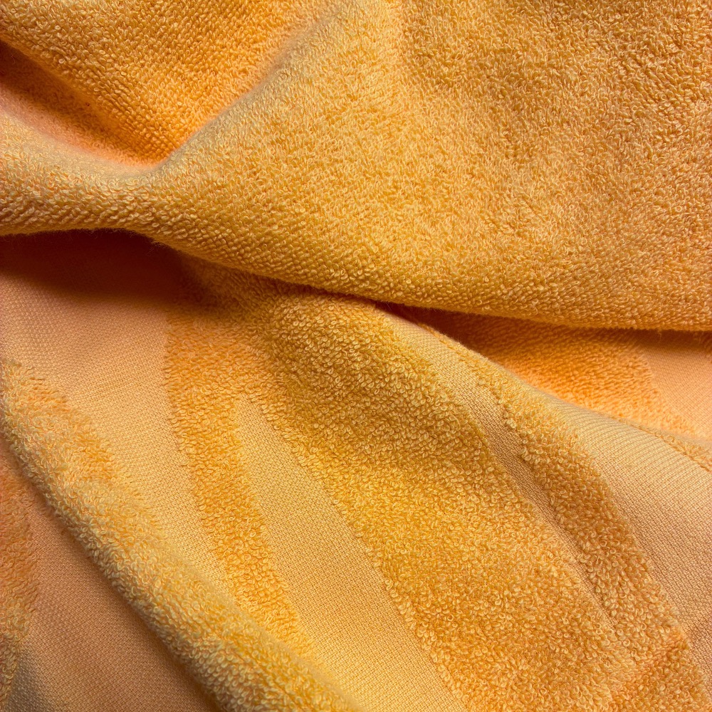Handtuch Hoch-Tiefwebung in Orange: Motiv als Reliefwebung im Frottier